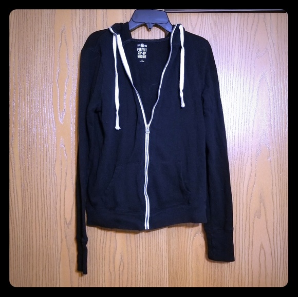 black hoodie with thumb holes